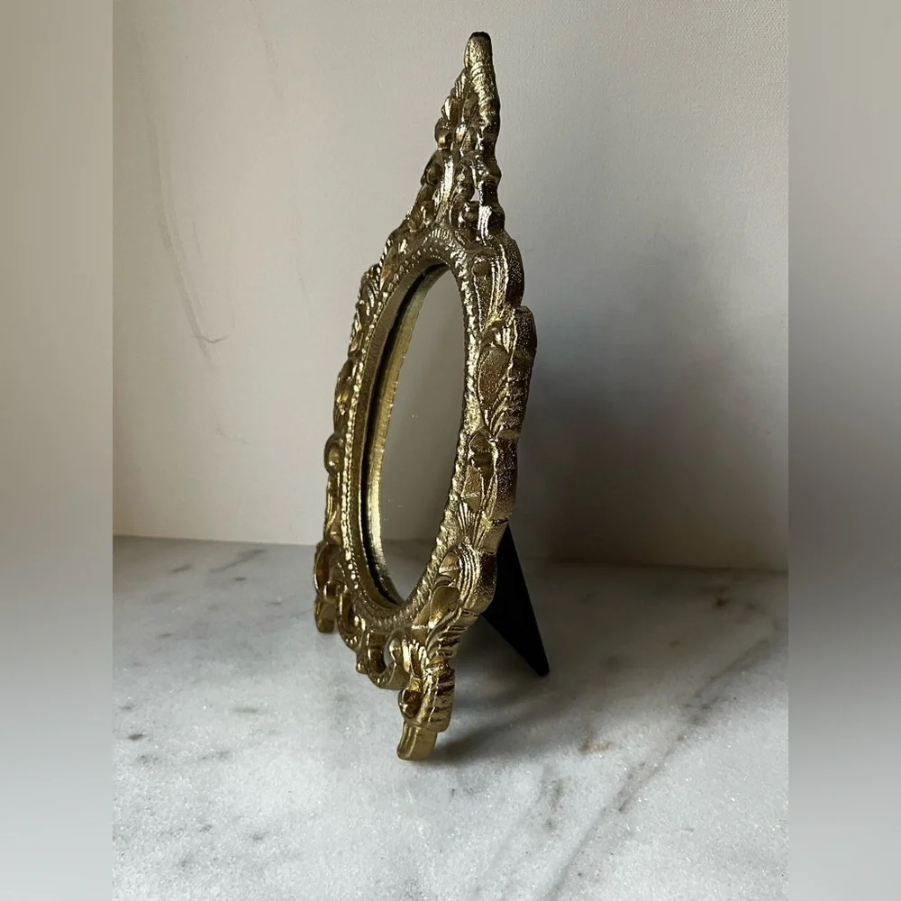 Ornate Vanity Mirror Oval metal Frame Scrollwork Tabletop Stand..